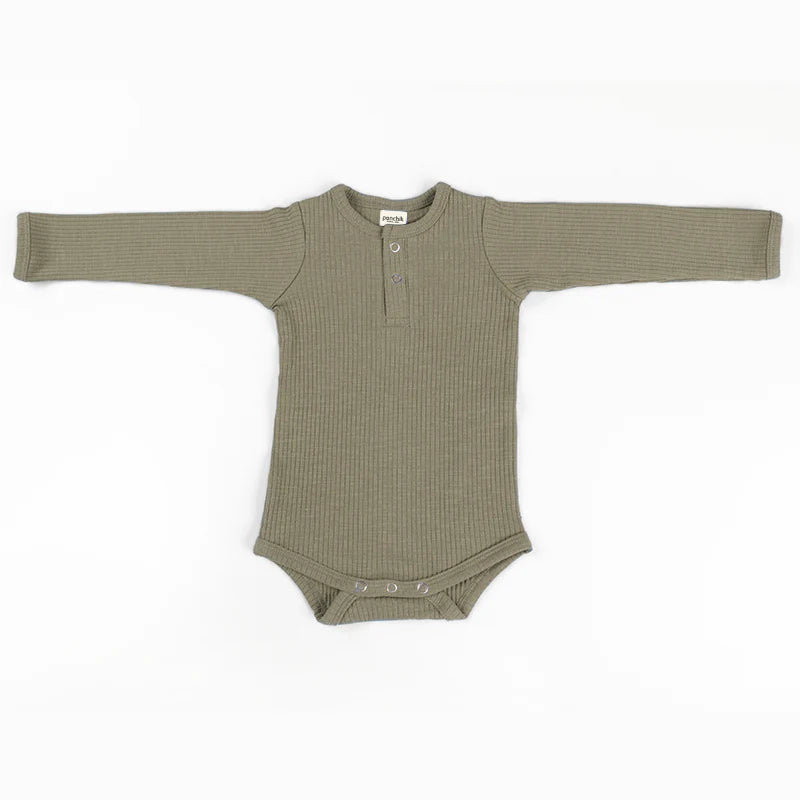 
                      
                        Cotton Rib Baby Bodysuit | Thyme
                      
                    